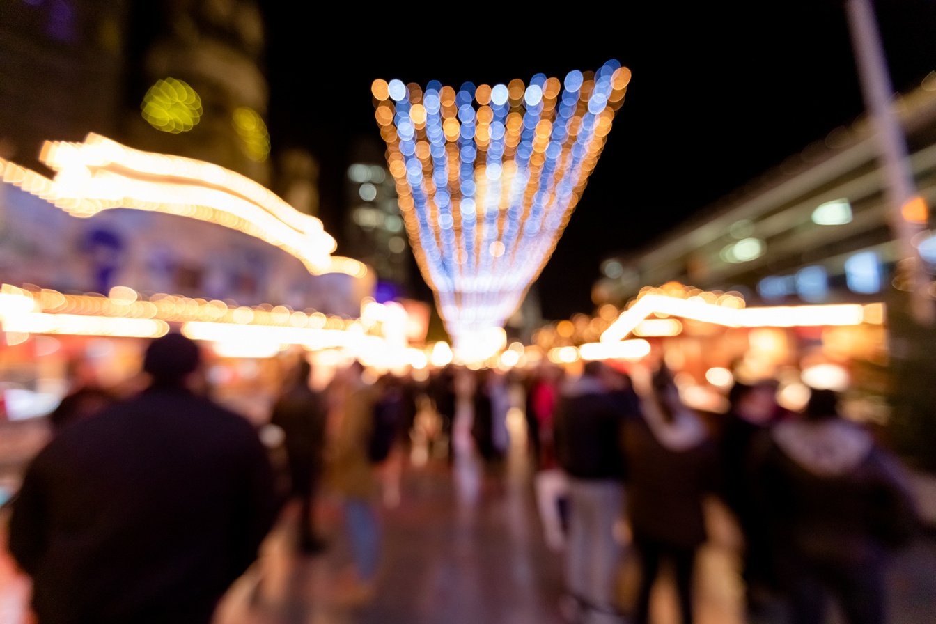 Blurred Christmas background for template. New year concept, unfocused lights and copy space. Abstract bokeh, close-up photography